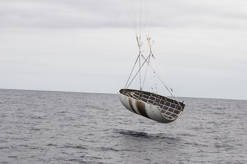 The Iridium-6 fairing just misses Mr. Steven, SpaceX's fairing recovery ship