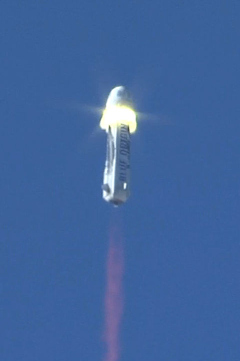 The NS2 booster, underneath the crew capsule at the moment of abort motor ignition.